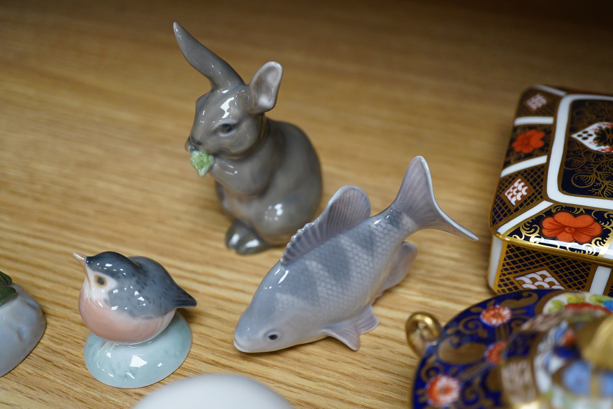 Six small Copenhagen figures, a Derby penguin and four other items